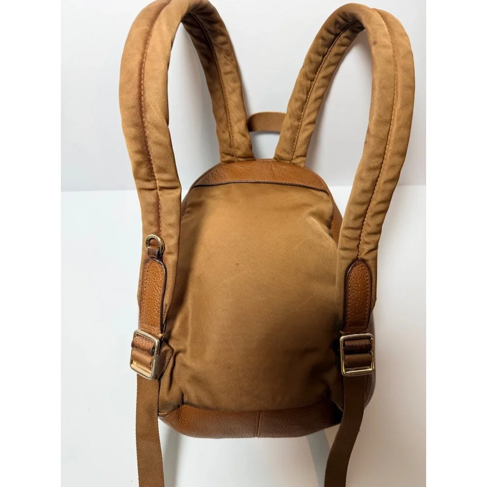 Coach Saddle Leather Mini Charlie Backpack F38263 Pebble Leather Backpack.